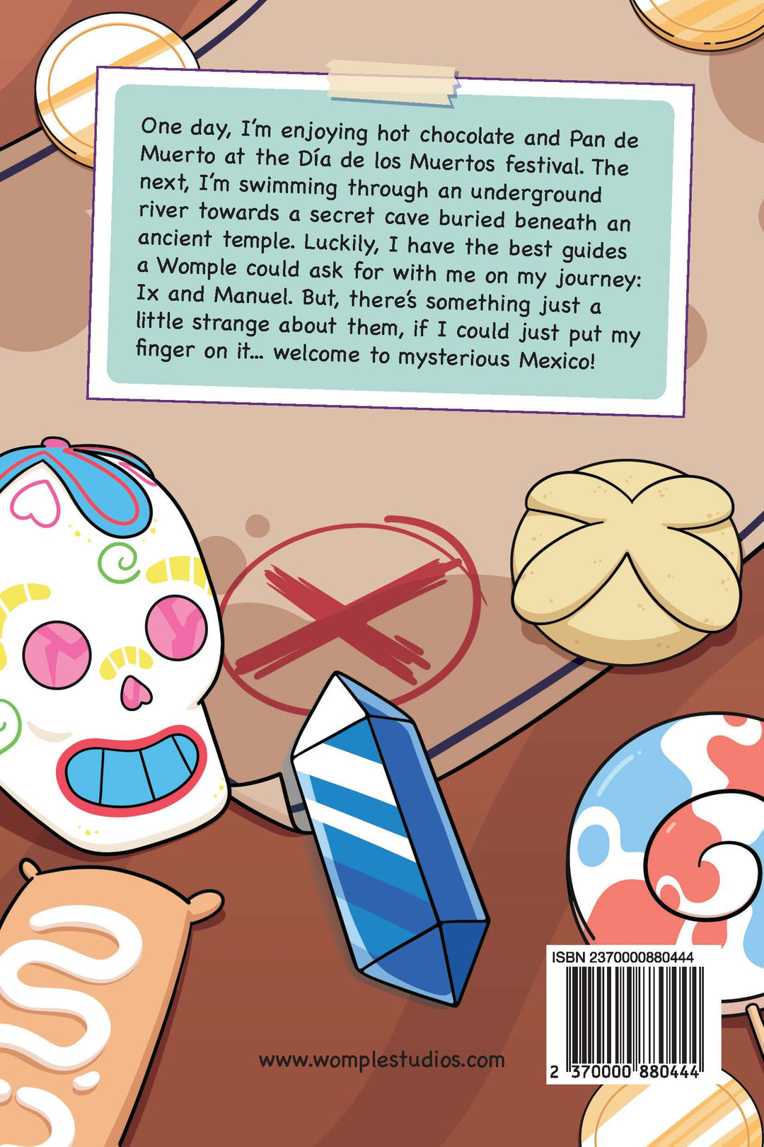 Back book cover from 'The Map of Stone' by Womple Studios with text about a Wample character's journey, featuring a sugar skull, a pastry, and crystal.