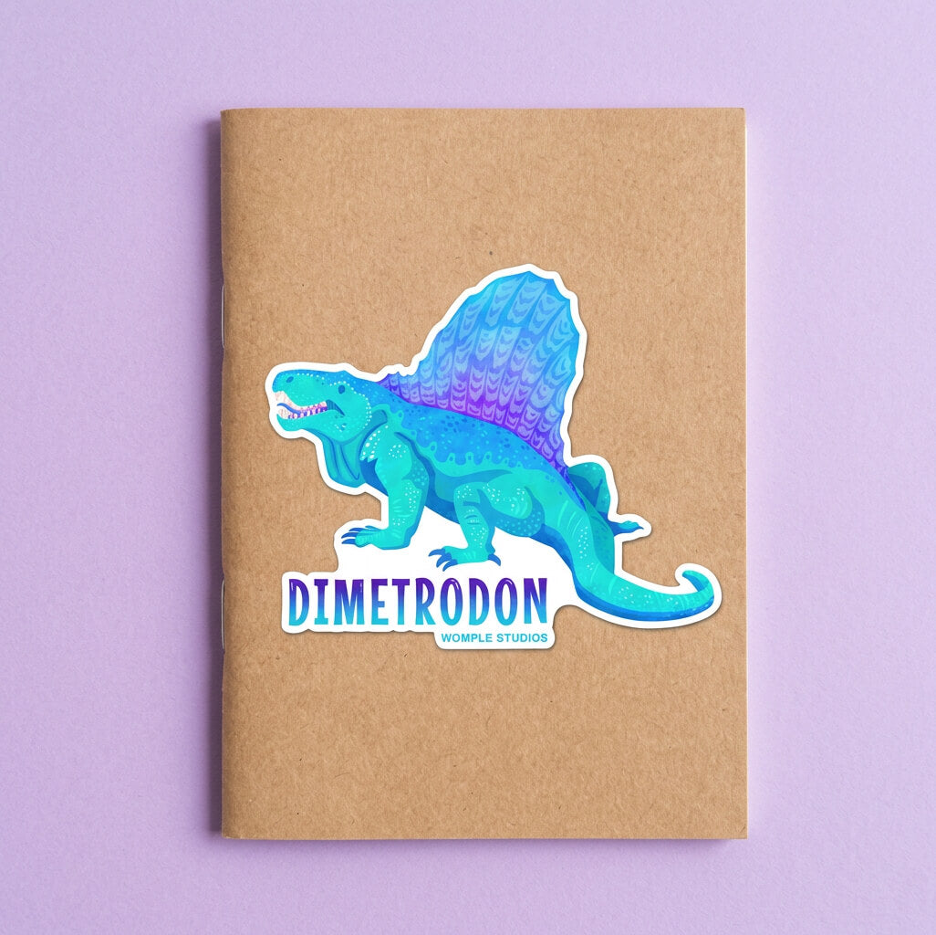 Notebook with a blue Dimetrodon sticker on a purple background