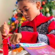 Boy with WompleBox: Iceland craft activity and book