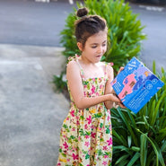 Girl receiving WompleBox in the mail