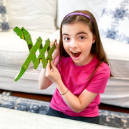 Girl with WompleBox: Brazil anaconda craft activity