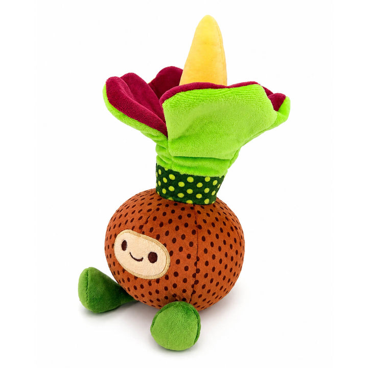 A plush toy shaped like a smiling corpse flower corm with green feet and a flower-like bloom in green and dark green with dots, burgundy, and yellow, photographed on a plain white background.