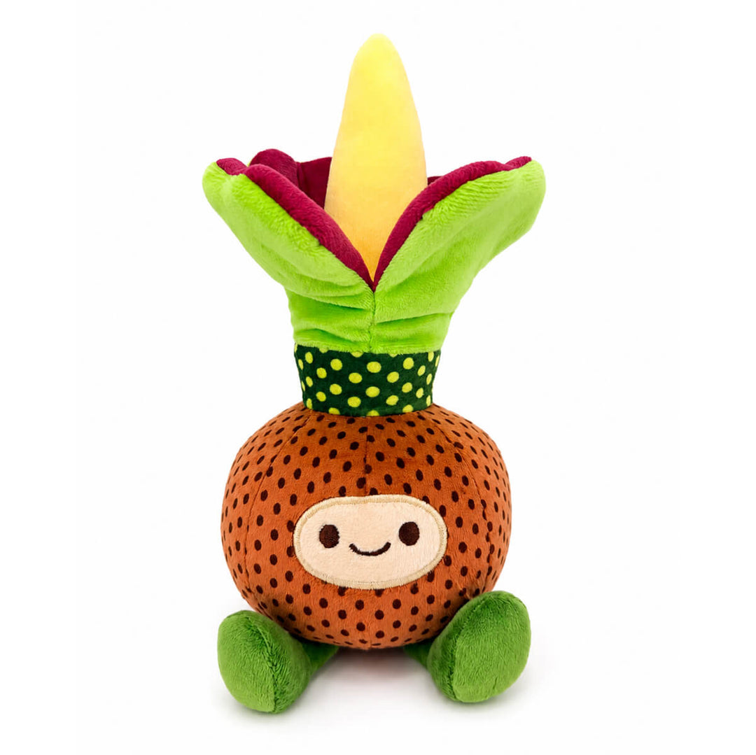 A plush toy with smiling face shaped like a corpse flower in bloom, sitting on a plain white background.